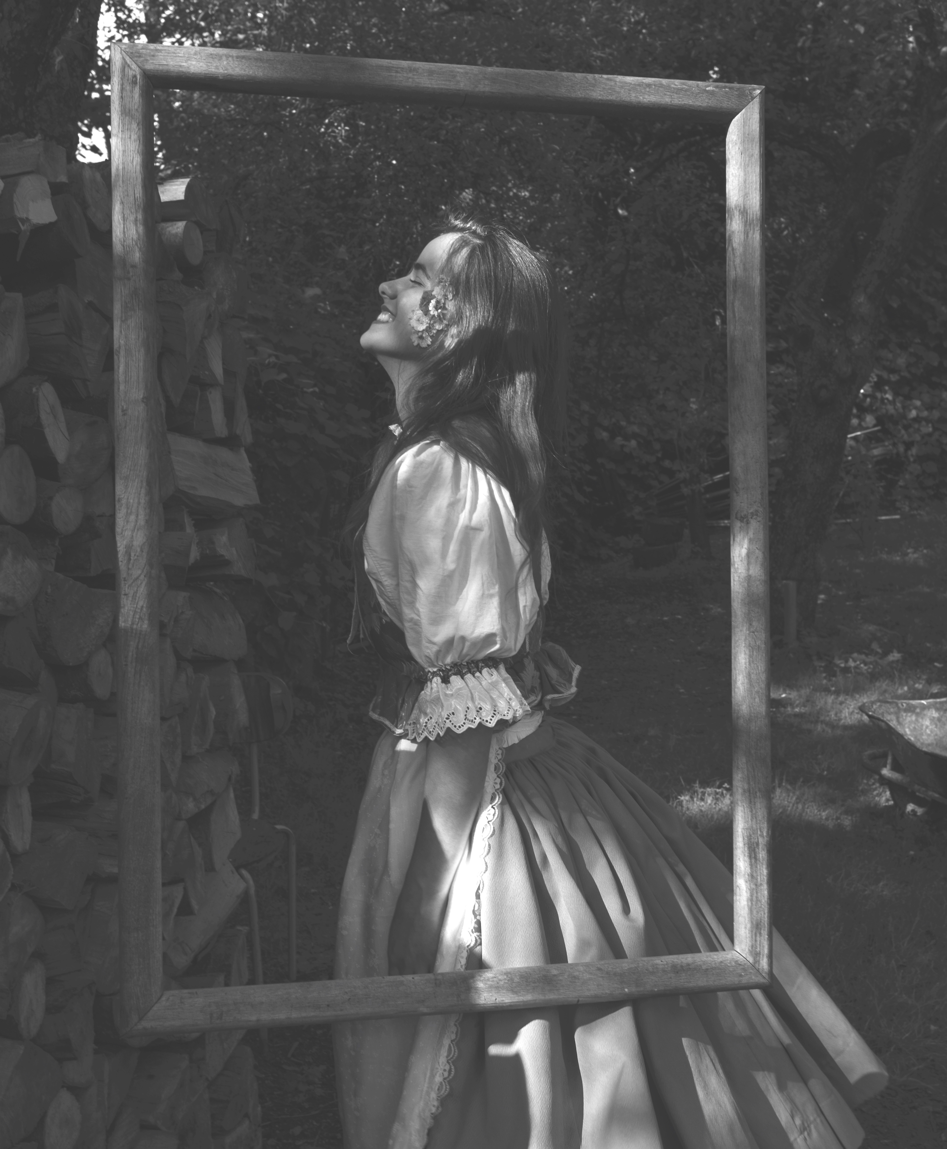 Frame in the air, and a Slovak girl. Black and white photography.